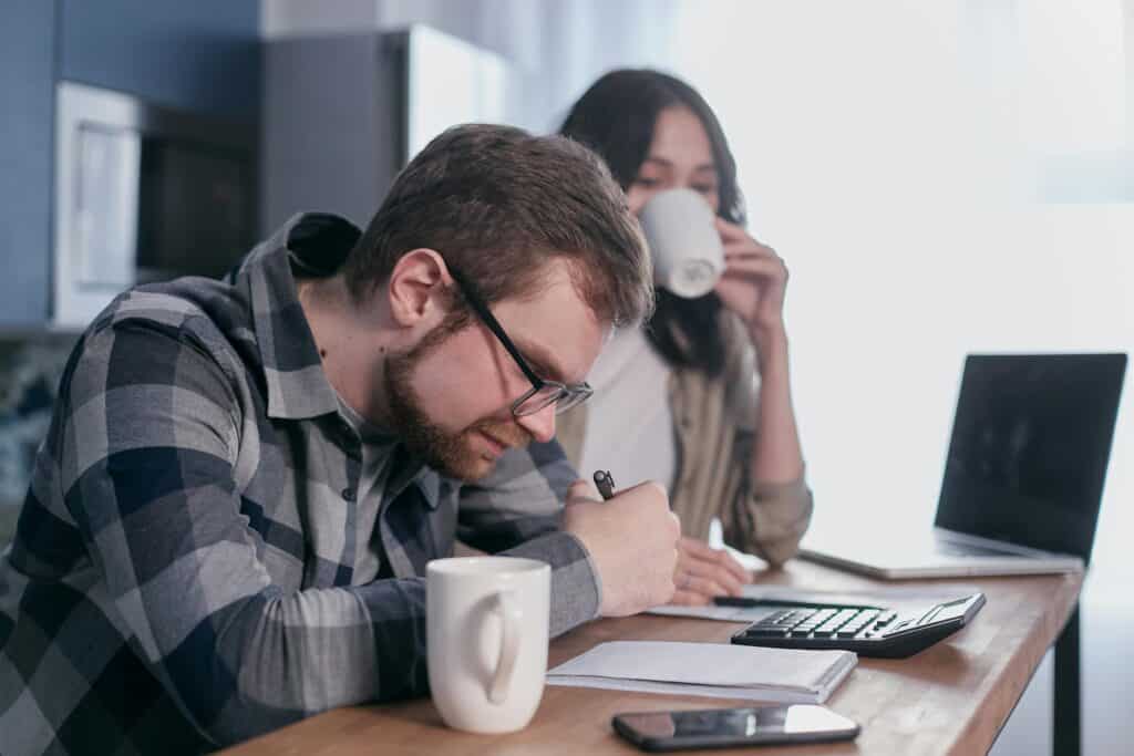 Man and woman reviewing their finances