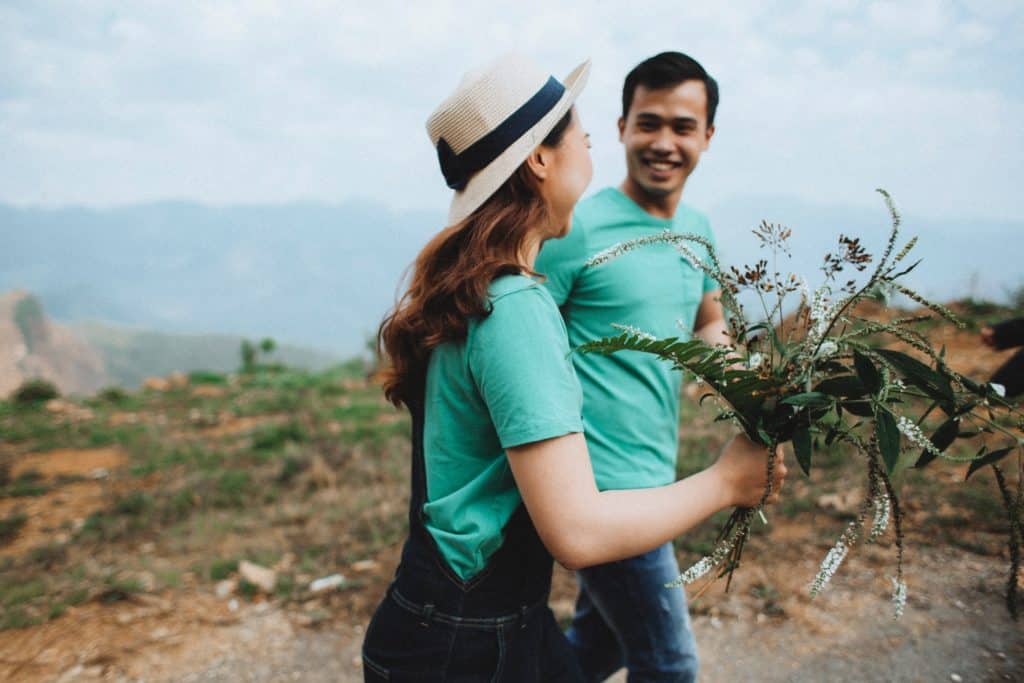 man helping a woman