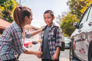 boy reuniting with mom