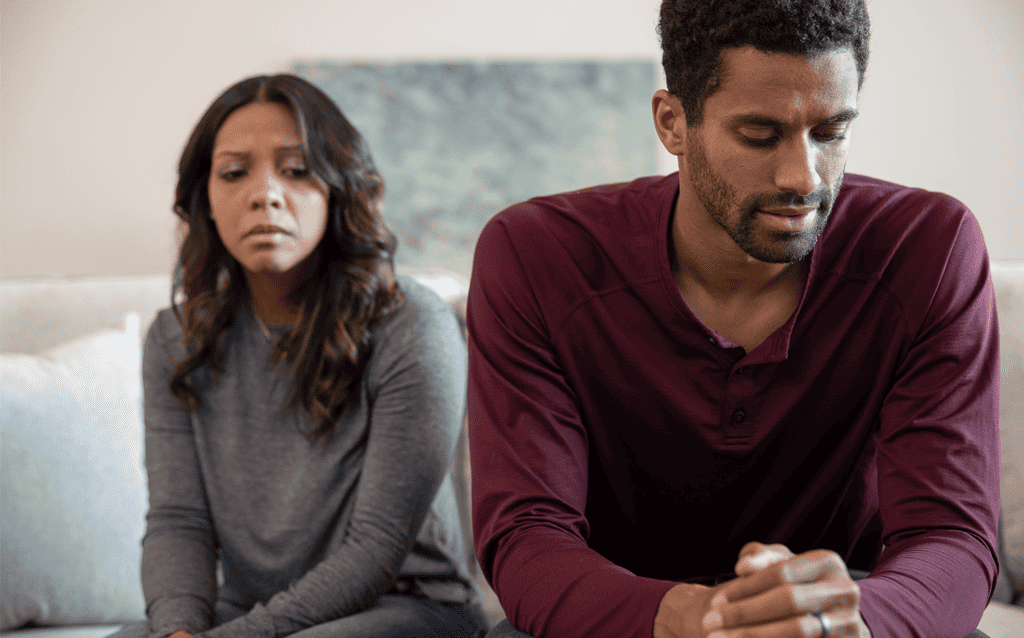 love is gone - a couple is turned away from each other