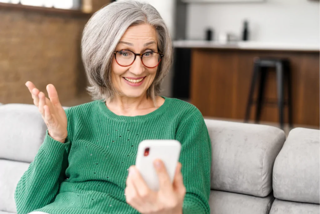 Grandmother talking to grandchildren over facetime