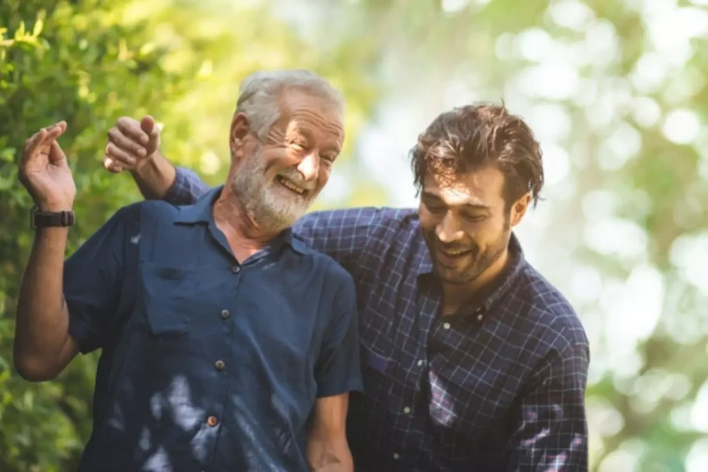 Father and son laughing together